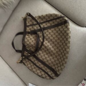 Gucci Beige and Brown Satchel pre loved. Authentic.
From Yogi's Closet